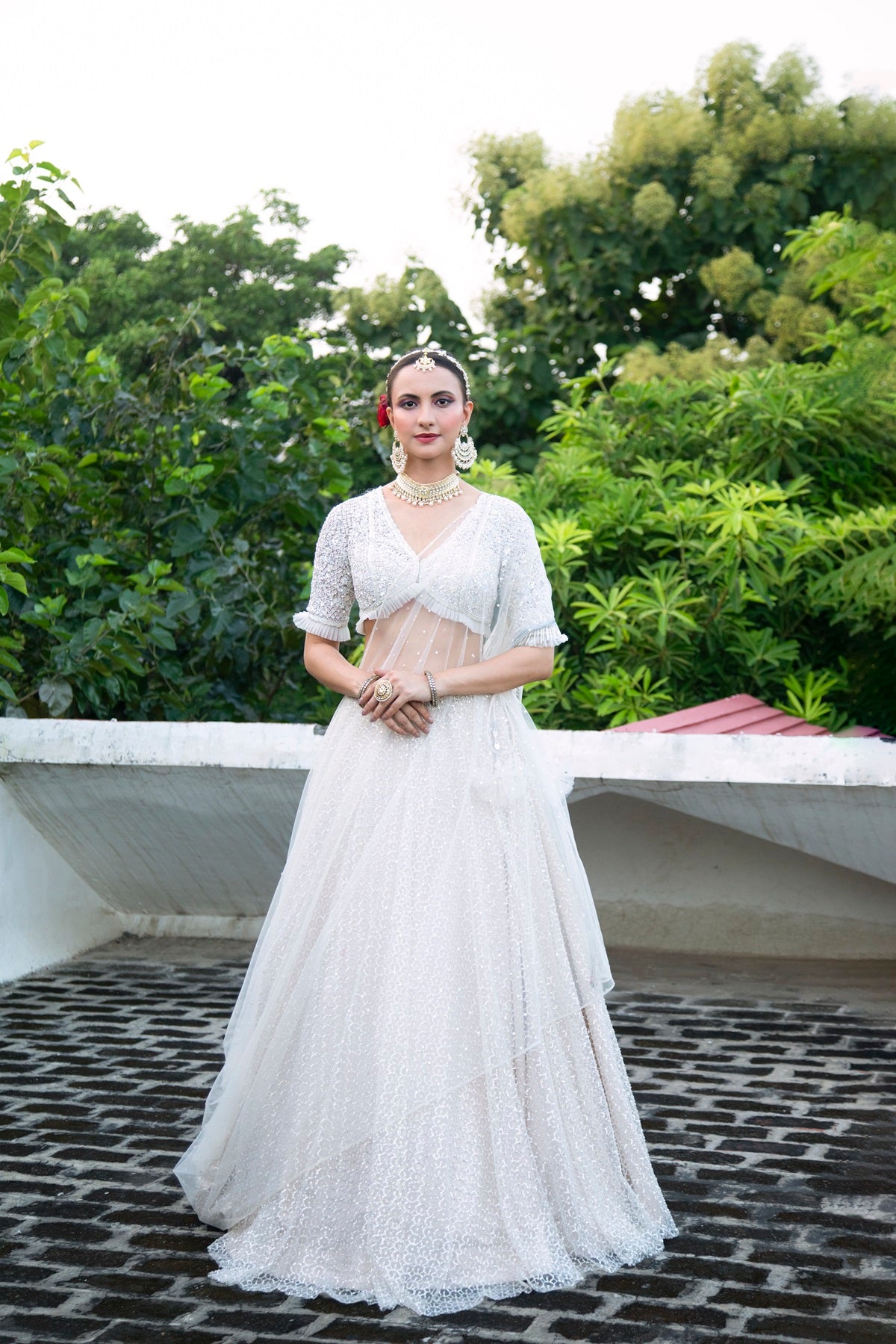 Ivory Net Embroidered Flowy Lehenga Set