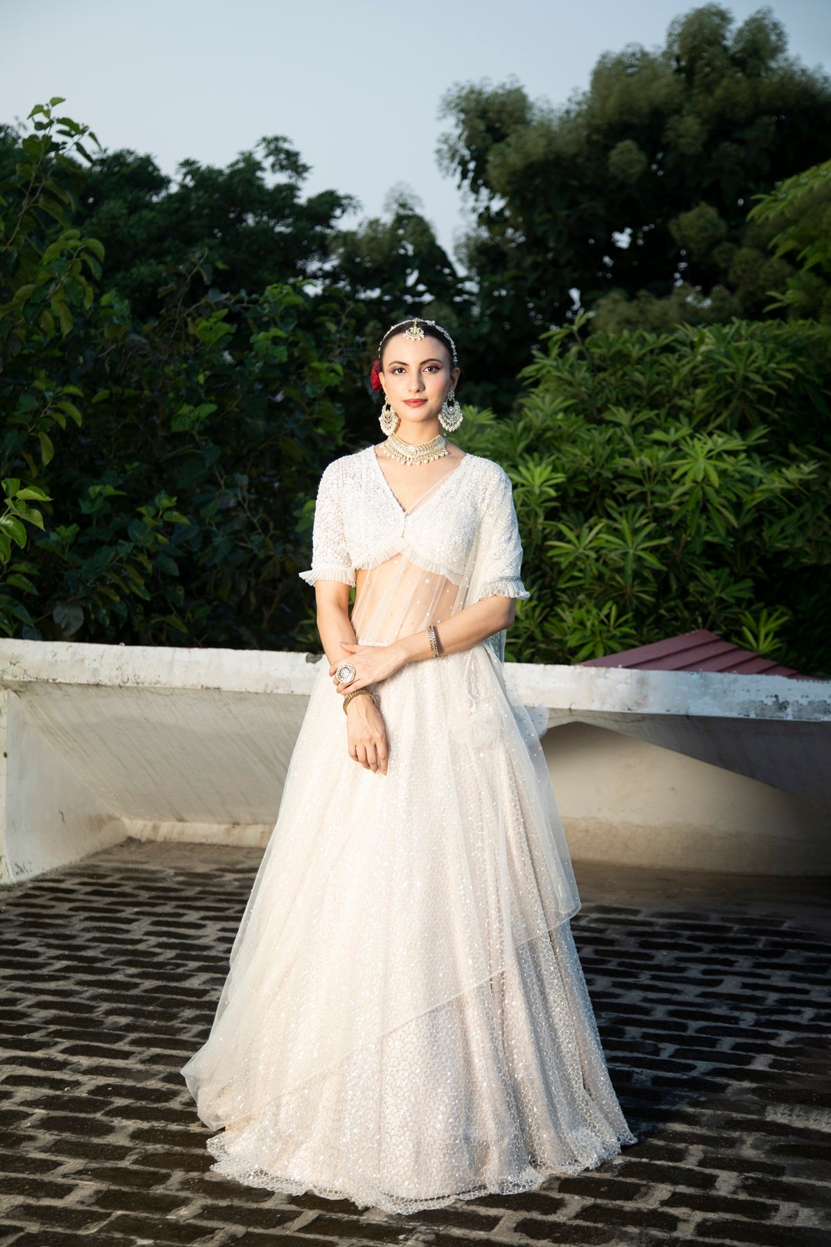 Ivory Net Embroidered Flowy Lehenga Set