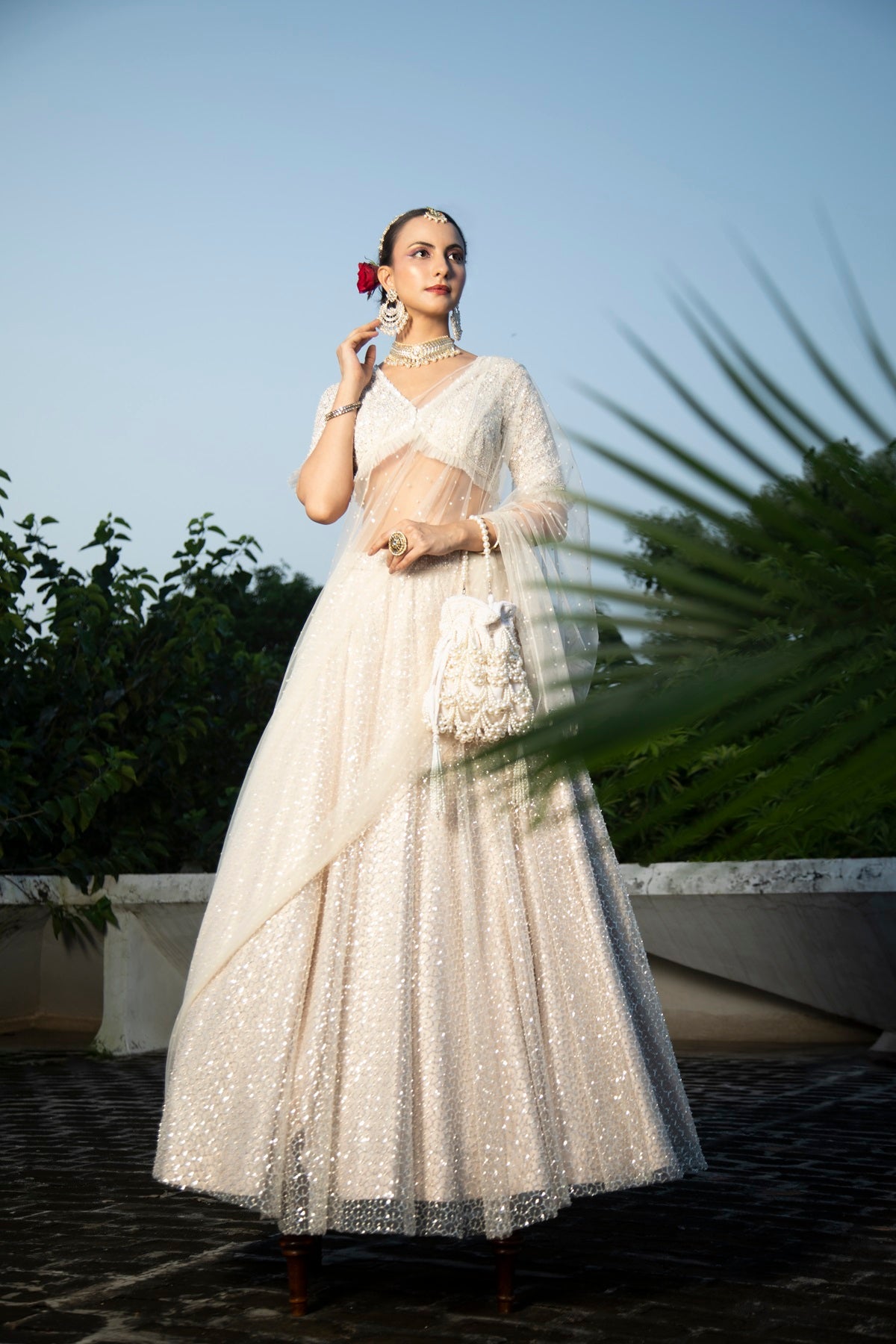 Ivory Net Embroidered Flowy Lehenga Set