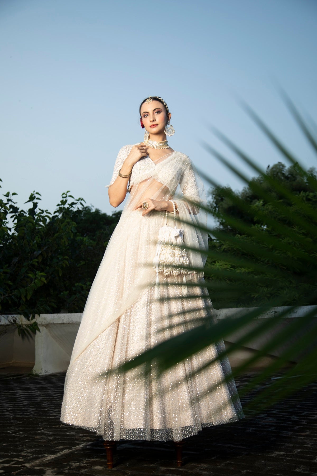 Ivory Net Embroidered Flowy Lehenga Set