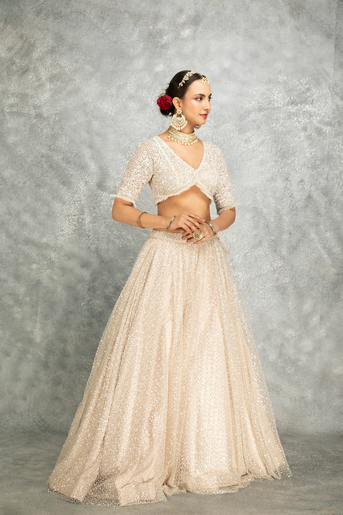 Ivory Net Embroidered Flowy Lehenga Set