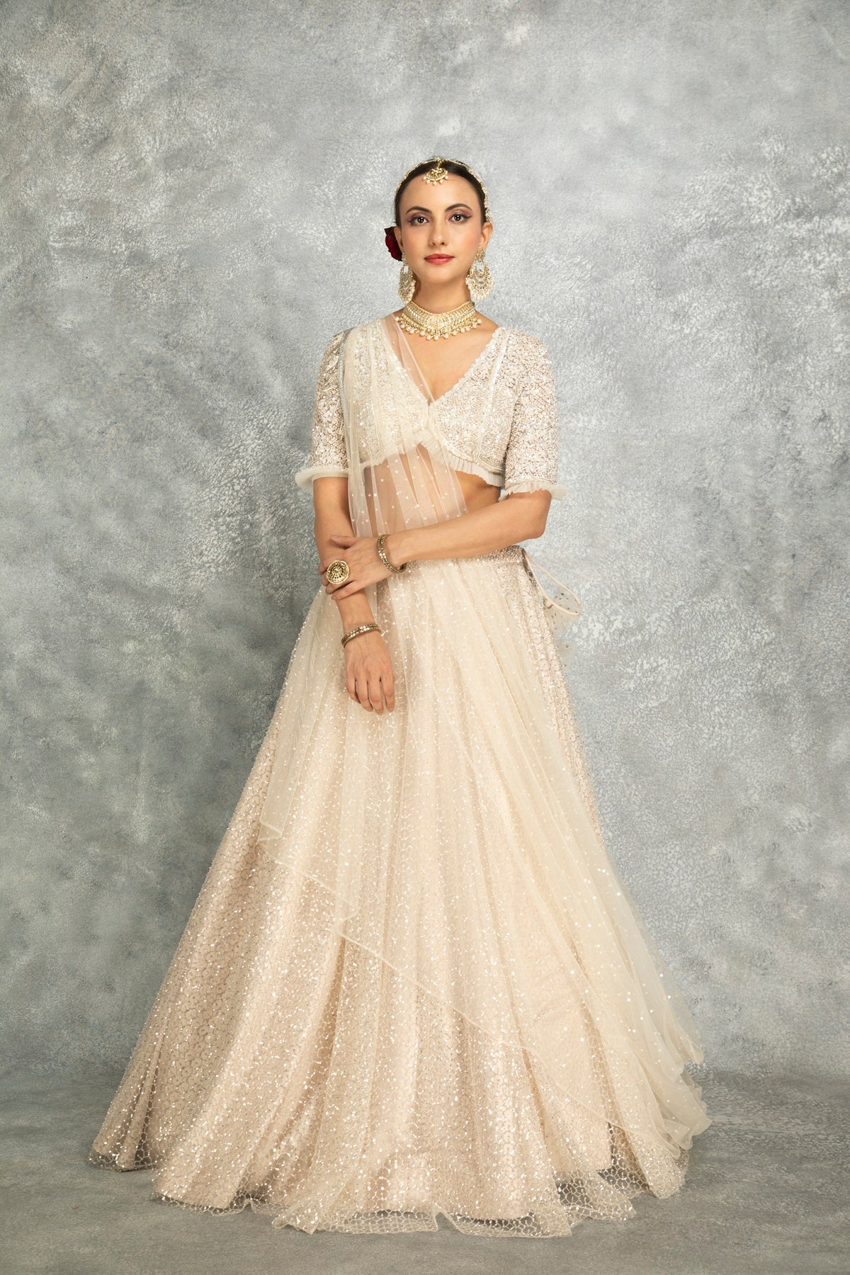 Ivory Net Embroidered Flowy Lehenga Set