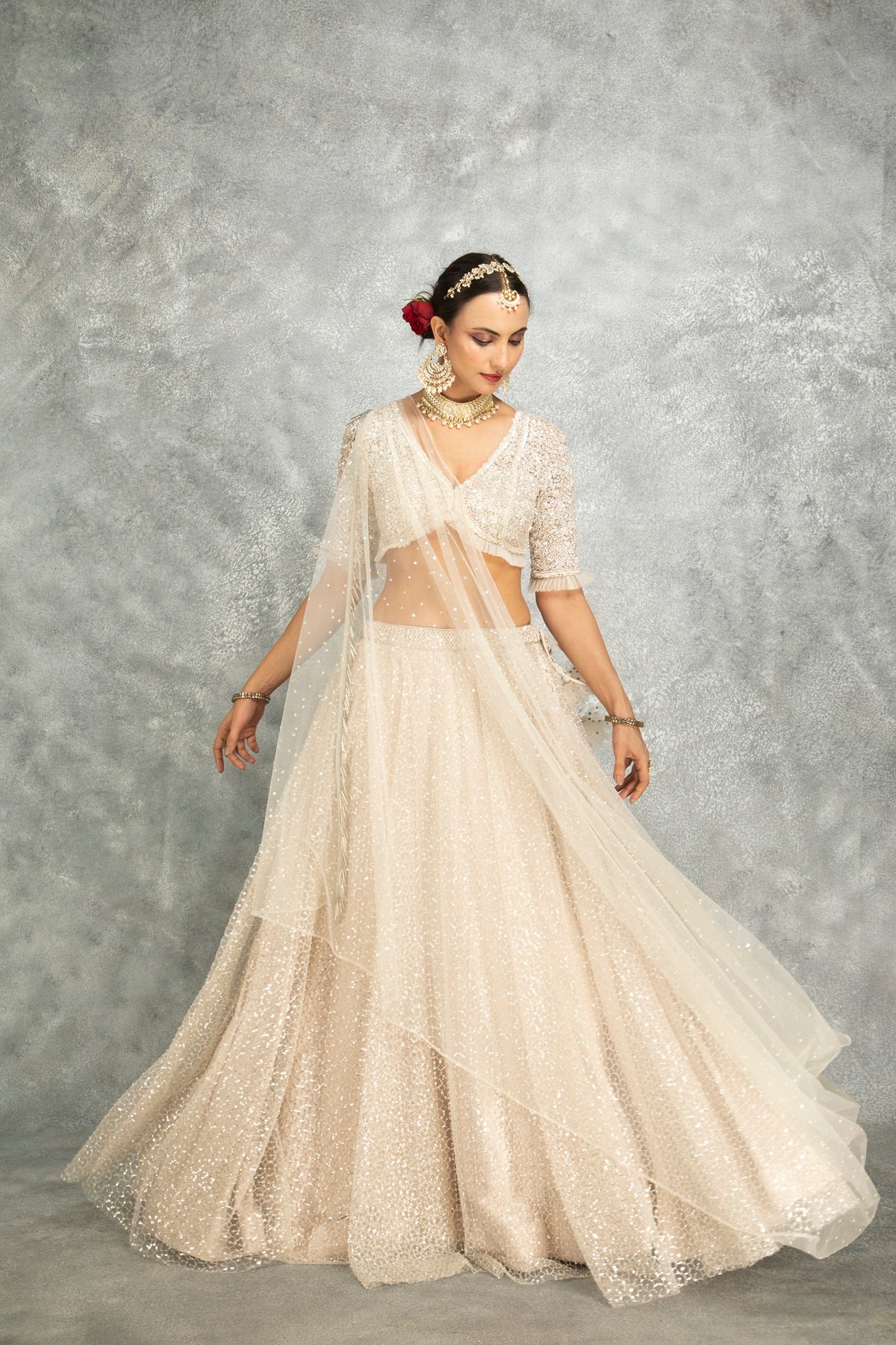 Ivory Net Embroidered Flowy Lehenga Set