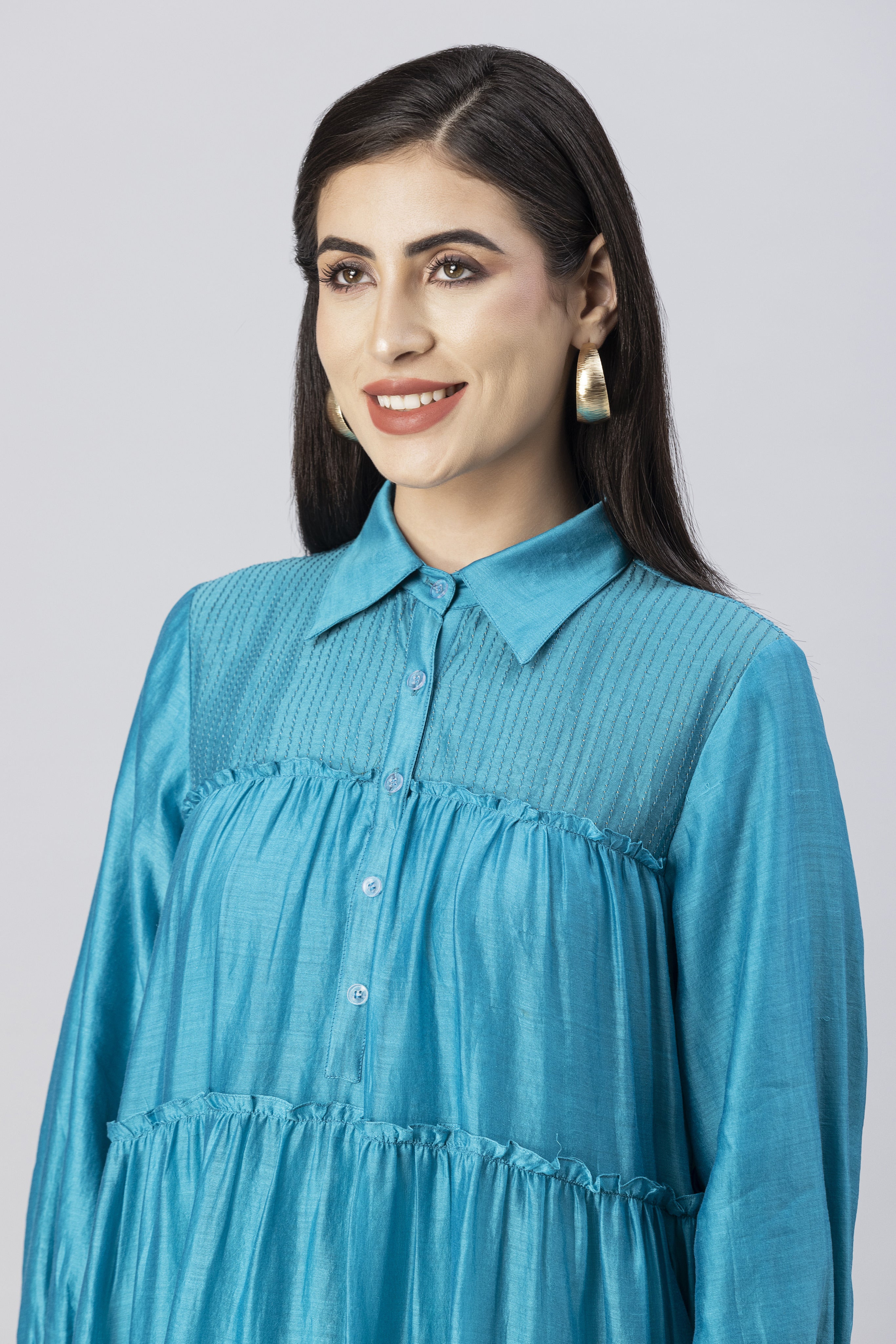 Turquoise Blue Tiered Kurta with Foil Print paired with Dhoti Pants