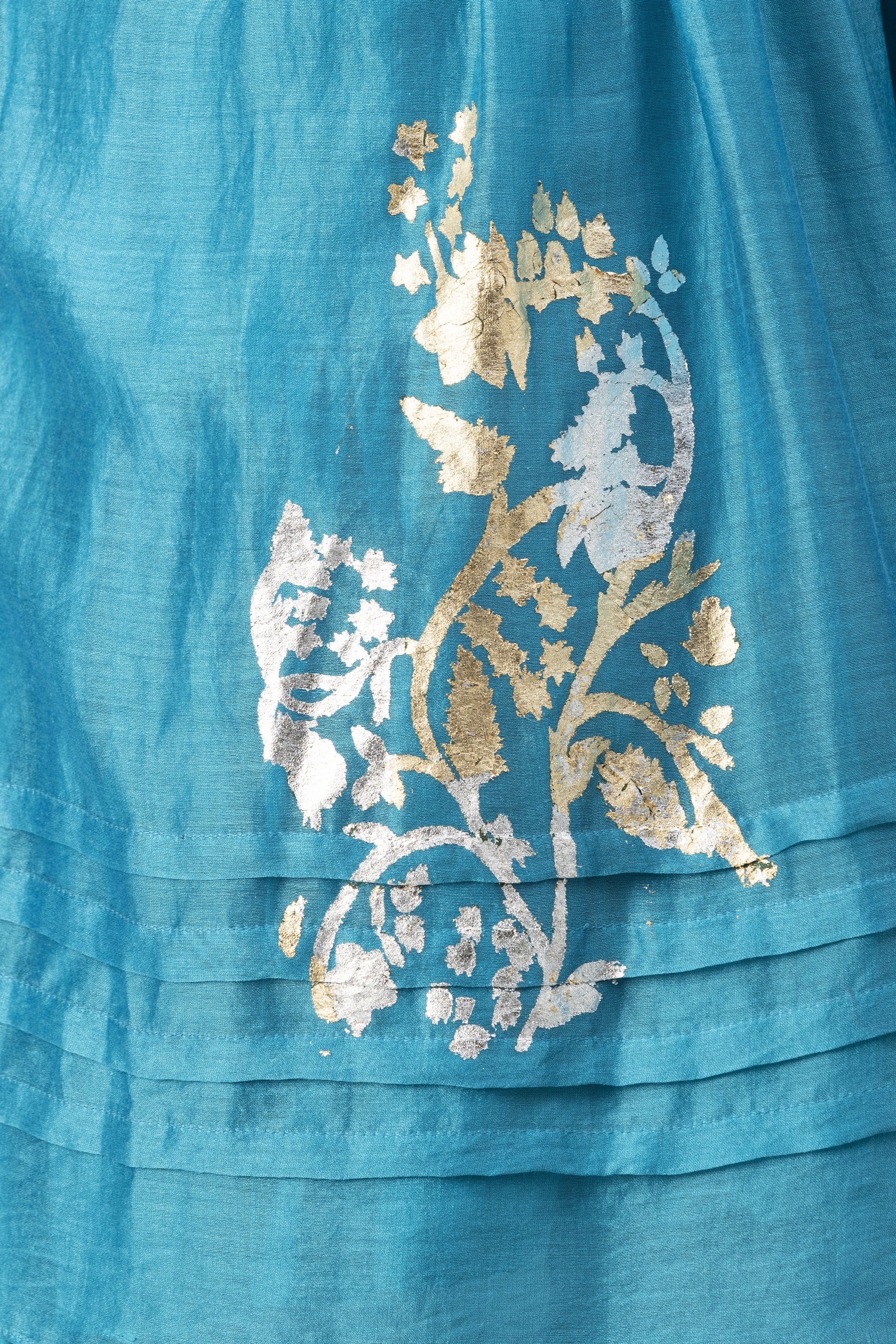 Turquoise Blue Tiered Kurta with Foil Print paired with Dhoti Pants