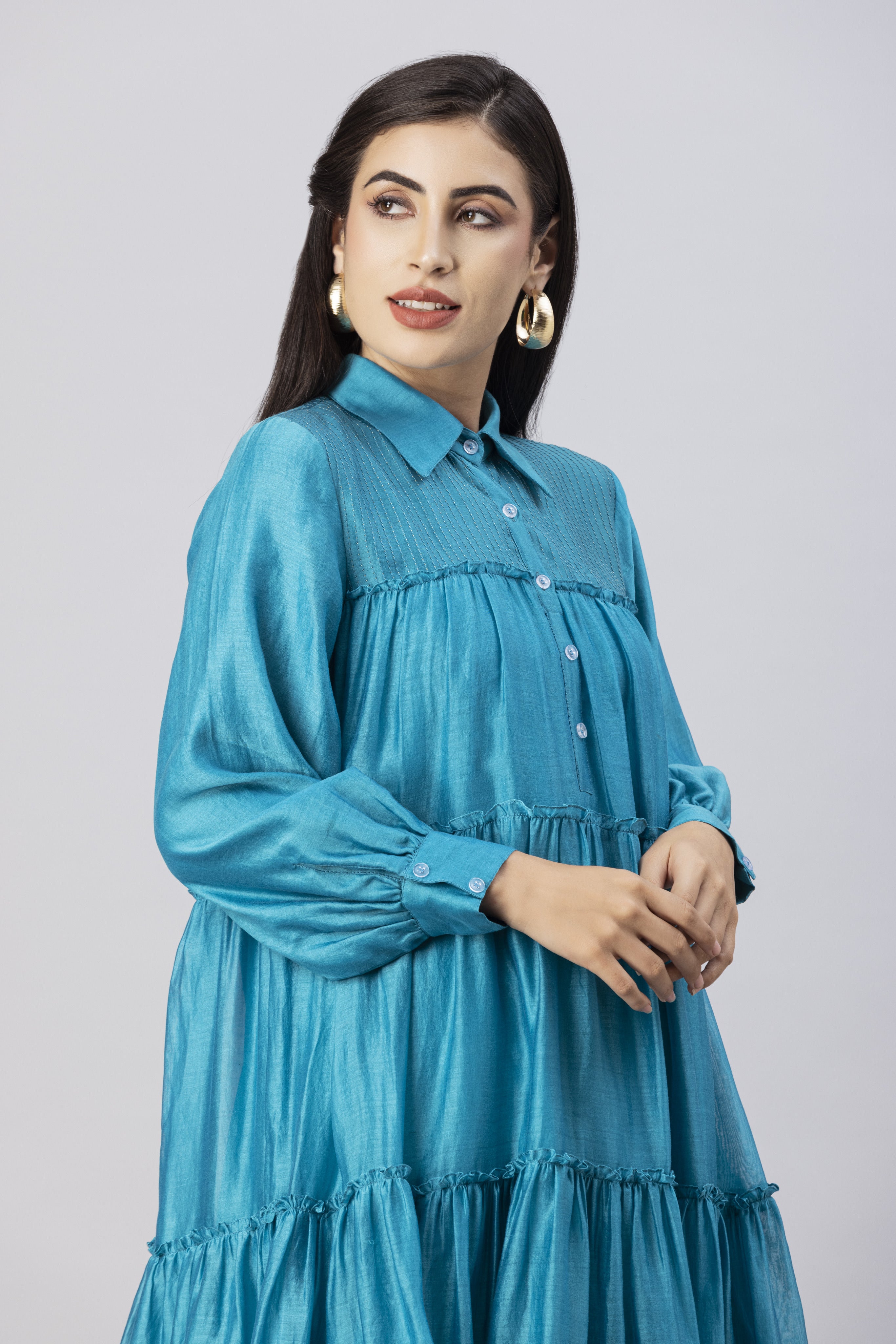 Turquoise Blue Tiered Kurta with Foil Print paired with Dhoti Pants